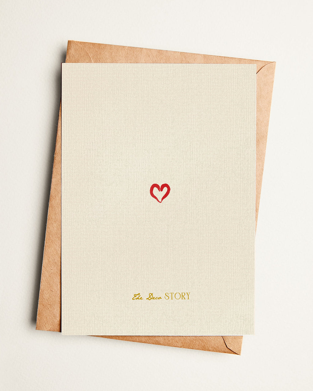 Card with a red heart and text on a beige background