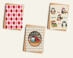 Three greeting cards with cute penguin  designs on a white background