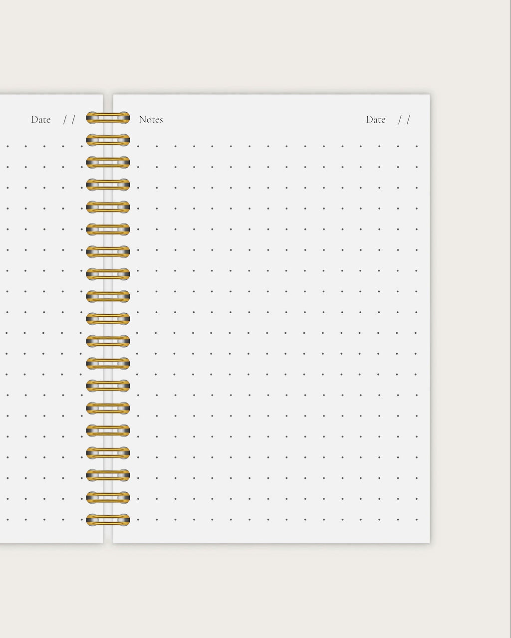 dotted notebook with gold spiral 