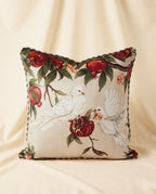 Decorative pillow with dove duo and pomegranates on a beige background