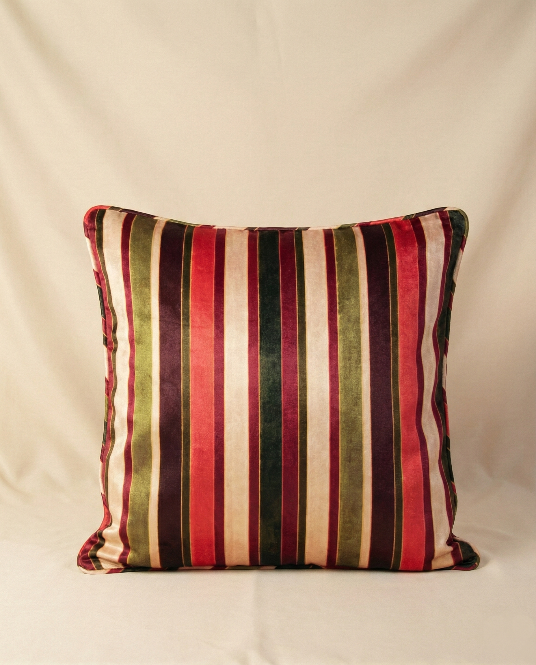 Striped pillow with multicolor pattern on a beige background