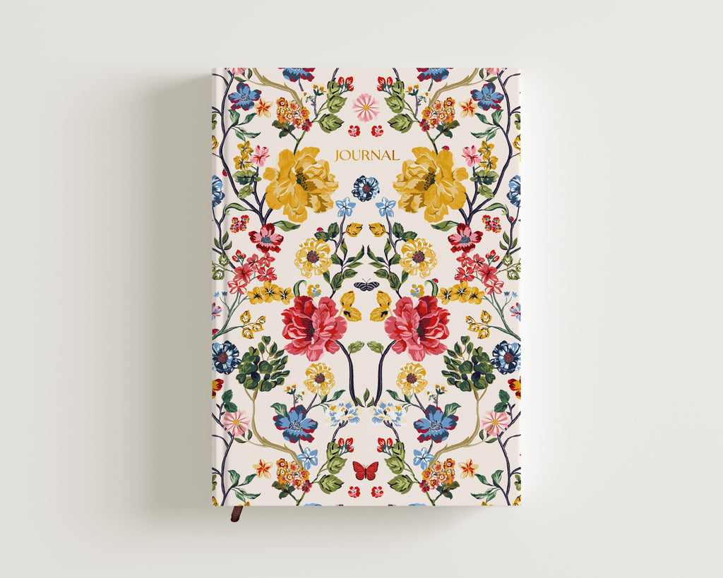  A5 floral-patterned diary with a beige background and multicolored flowers on the cover.