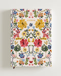  A5 floral-patterned diary with a beige background and multicolored flowers on the cover.