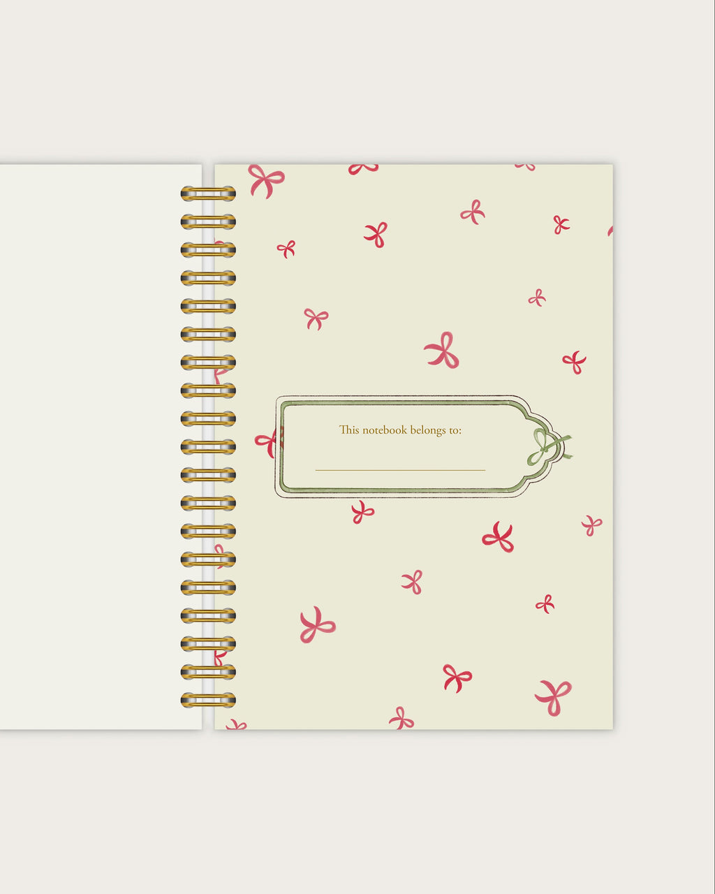 Spiral-bound notebook with decorative cover on a light gray background