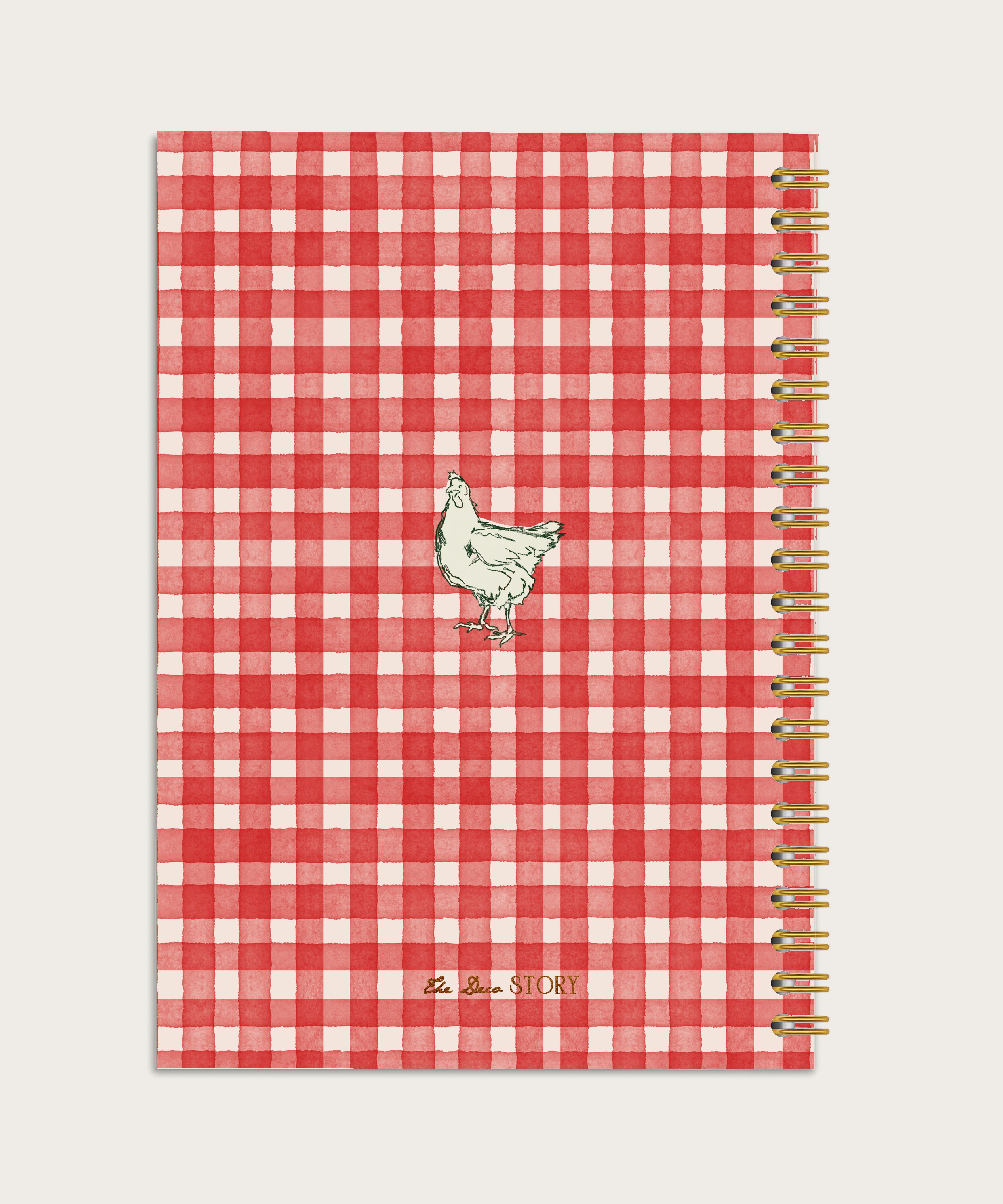 Red and white checkered notebook with a chicken illustration on a light gray background